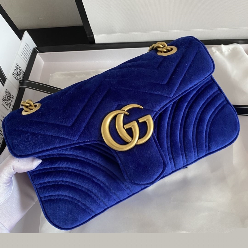 G*u*i clutch bags